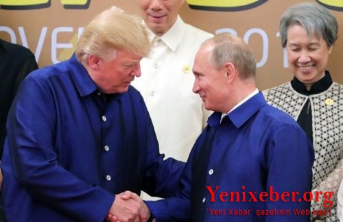 Tramp və Putin bir-birinin əlini sıxıblar