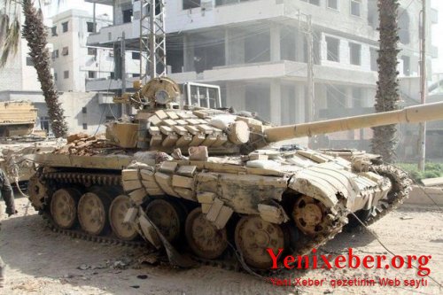 Suriyada İŞİD yaraqlılarının üzərindən tank ilə keçdilər